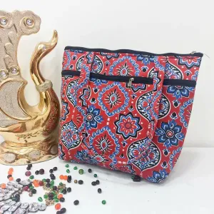 Medium Size Handbag Red Colour with Blue Prints.